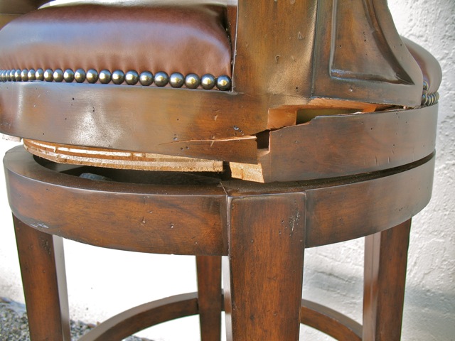 close-up of cracked back of barstool