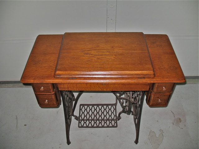 antique sewing machine table, refinished